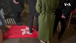 示威者在倫敦香港經貿辦農曆新年酒會會場外抗議