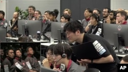 在ispace提供的視頻中的圖像中，東京的飛行控制人員在2023年4月26日早些時候嘗試在月球表面著陸後，等待該公司的“白兔”航天器的信號。 （美聯社照片）