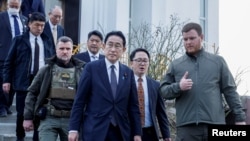  Fumio Kishida akiwa katika ziara ya mji wa Bucha, Ukraine March 21, 2023.