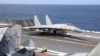 资料照：中国军队在台湾周边海域举行军演，一架歼-15战机准备从山东号航母上起飞。（2023年4月9日）