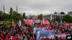 Union members march during Labor Day celebrations in Istanbul, May 1, 2024. Police in Istanbul detained dozens of people who tried to reach the city's main square, Taksim, in defiance of a government ban on celebrating May 1 Labor Day at the landmark location.