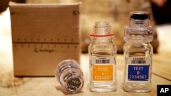 FILE - A test kit for human urine doping testing with A and B sample bottles is displayed for an illustration photo in London, Dec. 12, 2016.