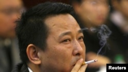 前矿业大亨刘汉过去在一次会议上