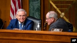 Роберт Менендес и Джим Риш