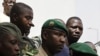 Lieutenant Amadou Konare, center, spokesman for coup leader Amadou Haya Sanogo, arrives to address supporters, in Bamako, Mali, March 28, 2012.