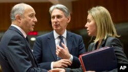 A painting, created by French artist Saype and said to be the world&#39;s largest biodegradable painting, is seen on the Chaux-de-Mont ski slope above the Alp resort of Leysin, Switzerland.