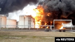 俄罗斯边境城市别尔哥罗德的储油库4月1日遭乌军空袭。照片来自俄罗斯紧急情况调查部，由路透社提供。