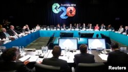 澳大利亞總理阿博特(遠處中央）在布里斯本主持了20國集團峰會的開幕式.