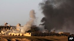 提克里特市建築物冒起濃煙