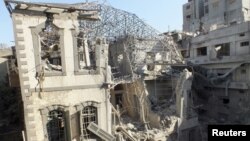 11月28日，霍姆斯的一座历史悠久的建筑被空袭摧毁