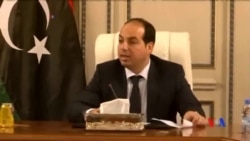 2014-06-03 美國之音視頻新聞: 利比亞新總理在警察護送下進入辦公室