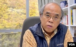 香港理工大学应用社会科学系前助理教授、香港民意研究所副行政总裁钟剑华