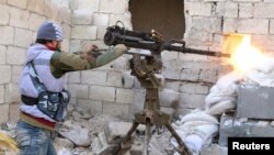 星期日受到西方支持的敘利亞反對派與正府軍作戰。