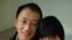 中国著名维权人士胡佳和妻子曾金燕 (档案照片)