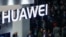 FILE - A logo of Huawei is seen during the Mobile World Congress in Barcelona, Spain.