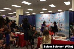 Attendees network at the National Association of Black Journalists and the National Association of Hispanic Journalists in Washington, Aug. 3, 2016.