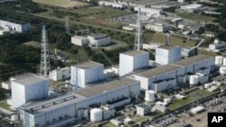 M&aacute;y bay tuần tra PC3 của Lực lượng Ph&ograve;ng vệ Biển của Nhật Bản bay tr&ecirc;n d&atilde;y đảo, 31/10/2011.