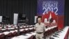 A security guard through a media work center prior to the first presidential debate on Oct. 1, 2012 at the University of Denver in Denver. 