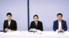 8月22日上午，日本首相岸田文雄（中）在围绕福岛一核处理水排海的相关阁僚会议上发言。