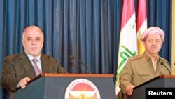 阿巴迪(左)與伊拉克庫爾德斯坦總統馬蘇德巴爾扎尼