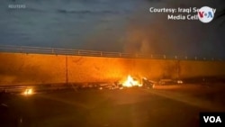 Последствия атаки на аэропорт Багдада, в результате которой погиб Касем Сулеймани