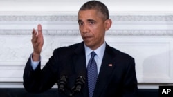 A fragment of the artwork 'Honour' from the series 'Five Elements of War', created by Ukrainian artists Daniel Green and Daria Marchenko, is on display at a studio in Kyiv. The artwork is made of bullet and shell cartridges from the frontline of a military conflict in eastern Ukraine, along with shoulder straps and other military items.