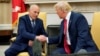 U.S. President Donald Trump shakes hands with John Kelly after he was sworn in as White House Chief of Staff in the Oval Office of the White House in Washington, July 31, 2017.