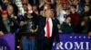 U.S. President Donald Trump waves after a campaign rally in Washington Township, Michigan, April 28, 2018.