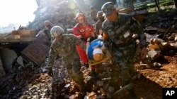 美国和中国军队星期五在中国昆明举行第四轮灾难管理交流演练。