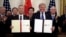 美国总统特朗普和中国国务院副总理刘鹤签署美中第一阶段贸易协议