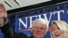 Republican presidential candidate and former House Speaker Newt Gingrich waves to the crowd with his wife Callista during a South Carolina Republican presidential primary night rally, Jan. 21, 2012, in Columbia, S.C.