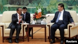 中國領導人習近平在北京人民大會堂會見印度國家安全顧問多瓦爾（Ajit Doval ）。 （2014年9月9日）