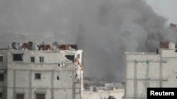 4月1日，叙利亚霍姆斯地区遭到叙政府军的炮击，硝烟弥漫