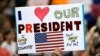 A supporter holds up a sign as President Donald Trump speaks at the Covelli Centre in Youngstown, Ohio, July 25, 2017.