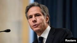拜登的國務卿人選布林肯(Anthony Blinken)2021年1月19日在參議院外委會接受質詢（路透社轉發媒體聯訪照片） 