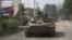 Российская бронетехника входит в Цхинвали. 11 августа 2008 г.
