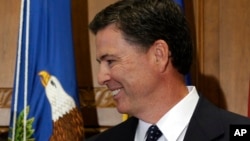 Джеймс Коми