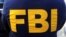 FILE PHOTO: An FBI logo is pictured on an agent's shirt in the Manhattan borough of New York City