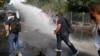 匈牙利發射催淚彈和水炮 移民改道克羅地亞