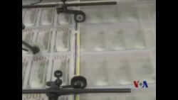 美联储1月起减购政府债券