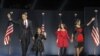 ** FILE ** In this Nov. 4, 2008 file photo, President-elect Barack Obama, left, his wife Michelle Obama, right, and two daughters, Malia, and Sasha, center left, wave to the crowd at the election night rally in Chicago. HBO has bought the U.S. rights to a
