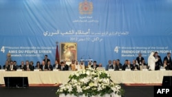 图片显示2012年12月12日叙利亚之友组织的代表会见阿拉伯国家和西方国家代表举行会议的现场