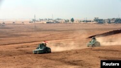 庫爾德敢死軍在巴什卡附近與伊斯蘭國武裝戰鬥