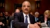Attorney General Eric Holder prepares to testify before a Senate Appropriations subcommittee on Capitol Hill, Washington, June 6, 2013.