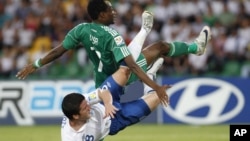 Taphataa Aljeeriyaa Ahmed Musa(gubbaa) taphataa Ingilaandi Billy Knott (jala) dorgommii kubbaa miilaa addunyaa U-20 ganna dabre Armeeniyaatti tapahtaniin Naayjeriyaan 1-0 moote