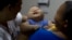 Caio Julio Vasconcelos, born with microcephaly, undergoes therapy at the Institute for the Blind in Joao Pessoa, Brazil, Feb. 25, 2016. U.S. researchers are assisting in the effort to determine whether Zika is causing babies to be born with unusually small heads.
