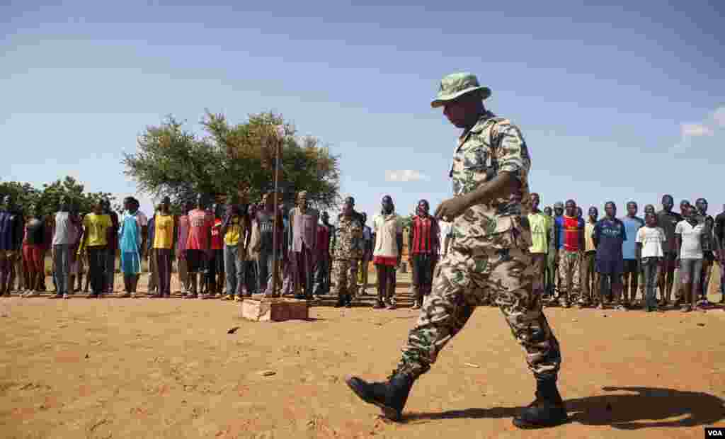 Anti-government protesters gather outside the Central World mall in the shopping district in central Bangkok, Jan. 13, 2014.