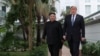 North Korean leader Kim Jong Un and U.S. President Donald Trump walk in the garden of the Metropole hotel during the second North Korea-U.S. summit in Hanoi, Vietnam February 28, 2019.