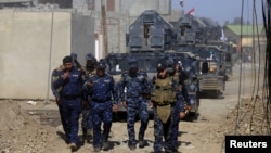 伊拉克安全部隊在摩蘇爾西邊與伊斯蘭國家武裝份子的戰鬥(2017年2月26日)