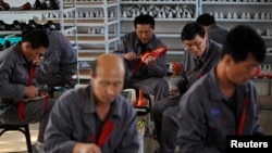 资料照片：在丹东工作的朝鲜劳工 